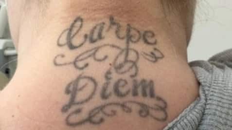 a tattoo on their face